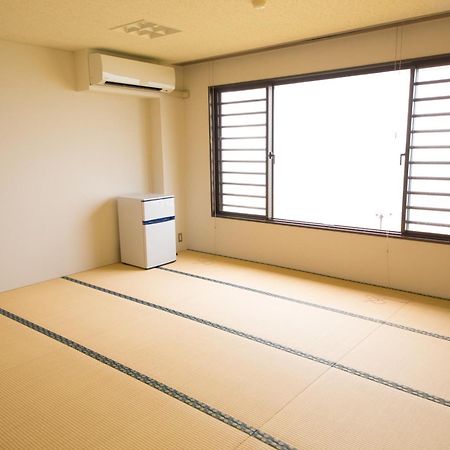 Sea Aiga Kaigetsu Hostel Sumoto Bagian luar foto