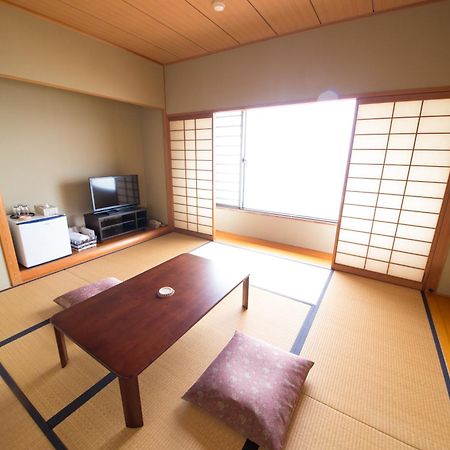 Sea Aiga Kaigetsu Hostel Sumoto Bagian luar foto