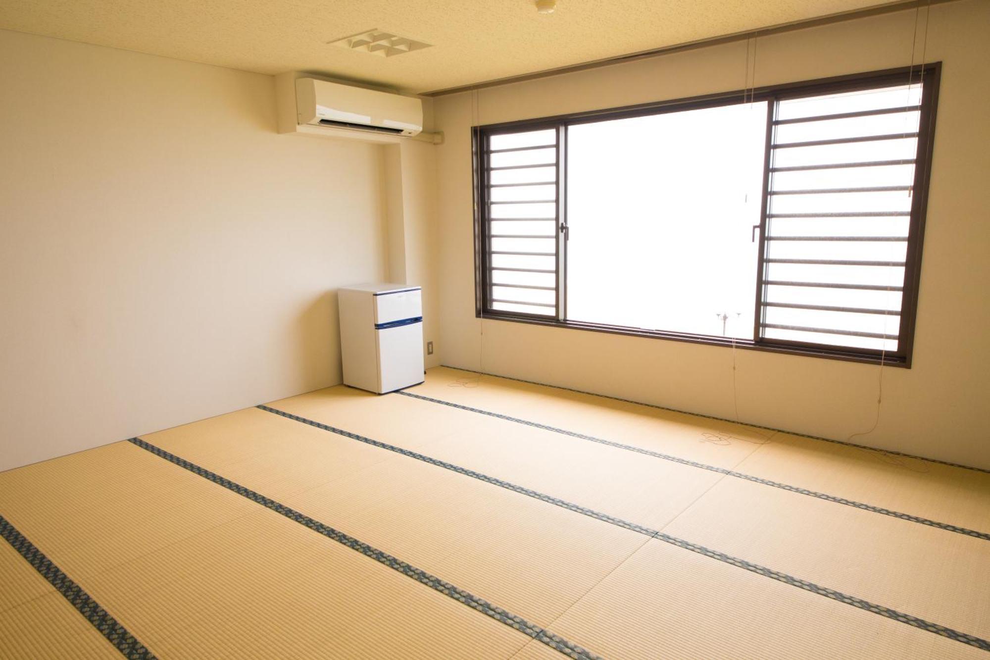 Sea Aiga Kaigetsu Hostel Sumoto Bagian luar foto