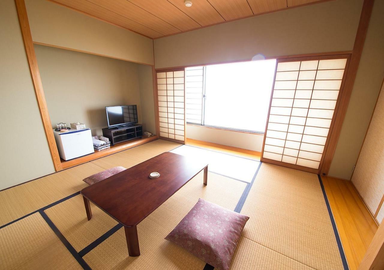 Sea Aiga Kaigetsu Hostel Sumoto Bagian luar foto